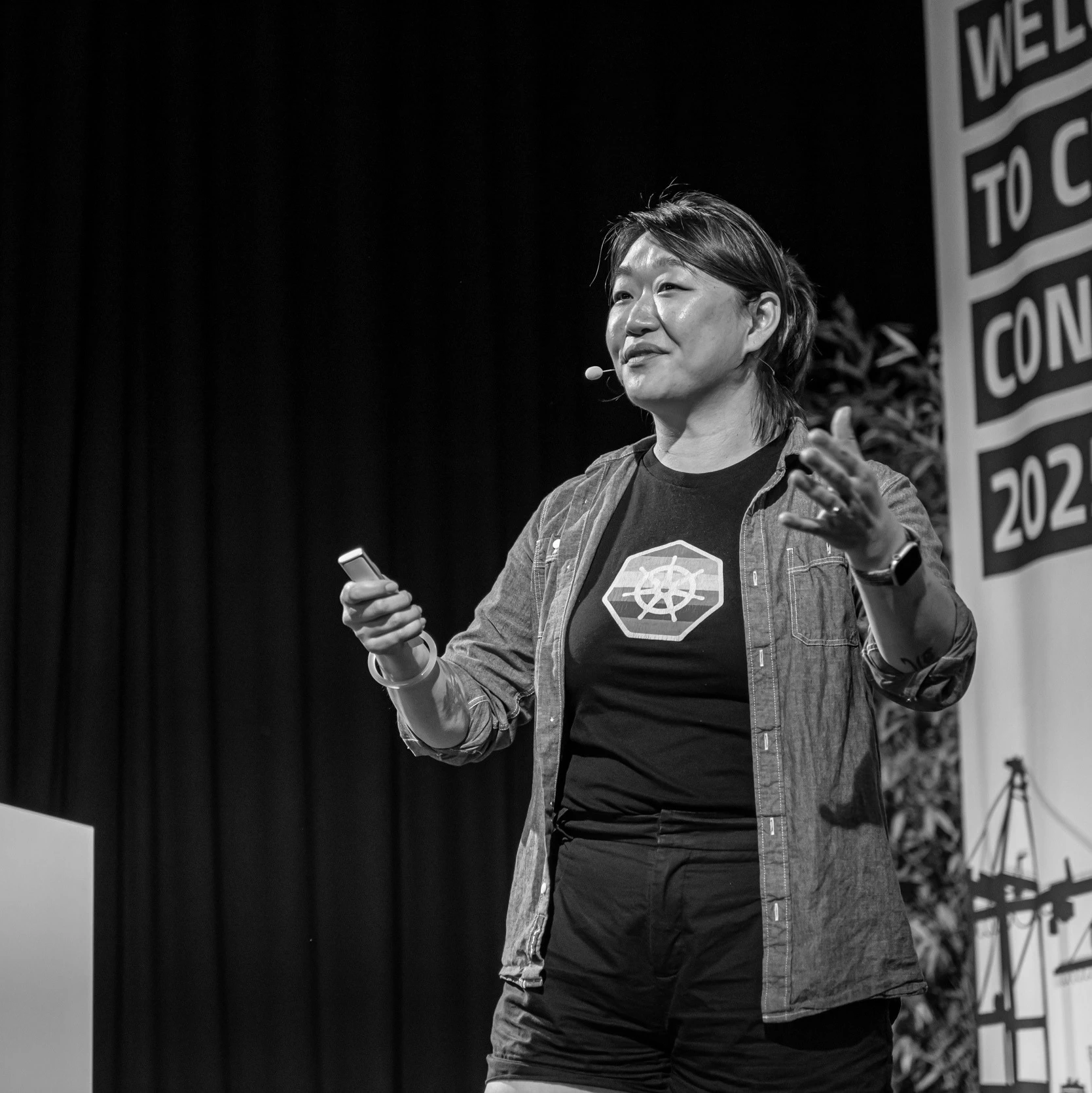 Lian speaking on stage